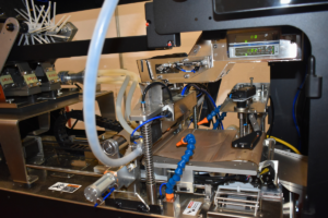 A wide shot of the mechanics to the automatic joint roller machine from RollPros