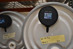 A wide angle shot of the Cure Pucks at work attached to our barrels of cannabis.